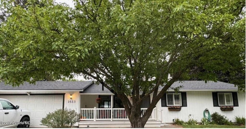 ranch-style house featuring a garage