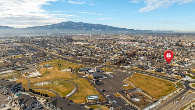 bird's eye view with a mountain view