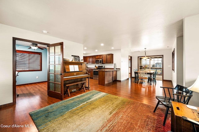 living room featuring dark wood-type flooring