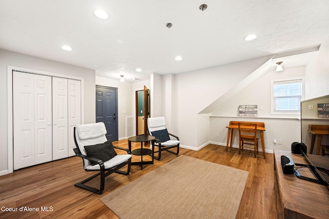 living area featuring hardwood / wood-style flooring