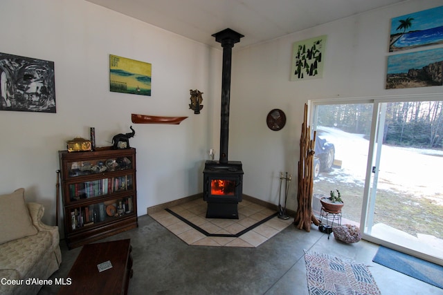 living room with a wood stove