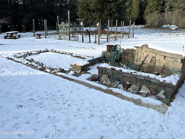 view of yard layered in snow