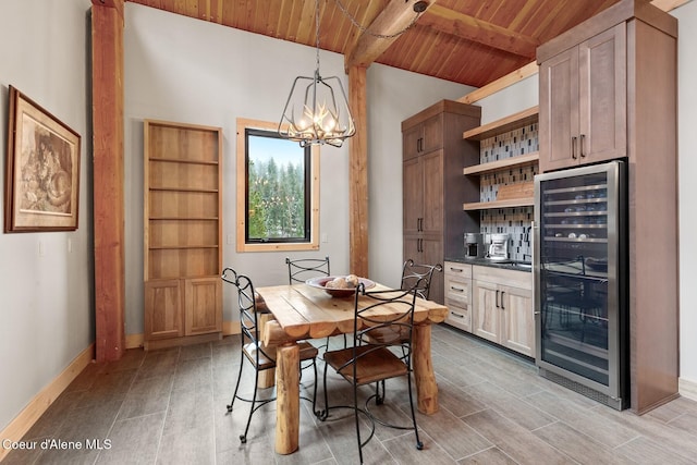 dining space with vaulted ceiling with beams, wine cooler, wooden ceiling, wood tiled floor, and an inviting chandelier