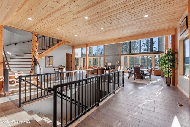 interior space featuring visible vents, wood ceiling, and recessed lighting