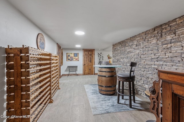 bar with light wood finished floors