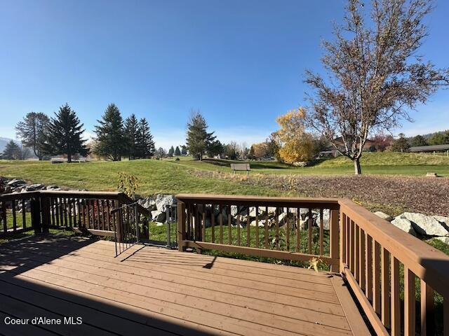 deck featuring a lawn