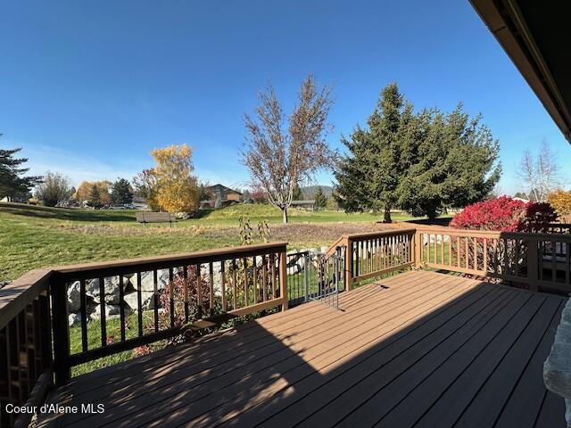 deck featuring a lawn