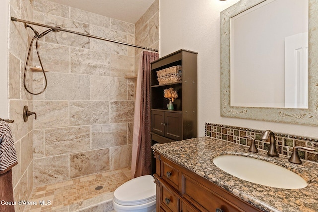 bathroom with vanity, backsplash, toilet, and a shower with shower curtain