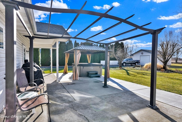 view of patio featuring a gazebo, area for grilling, and a hot tub