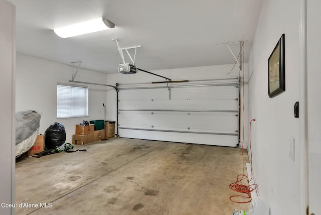 garage featuring a garage door opener