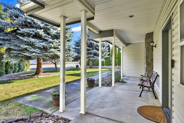 view of patio featuring a porch