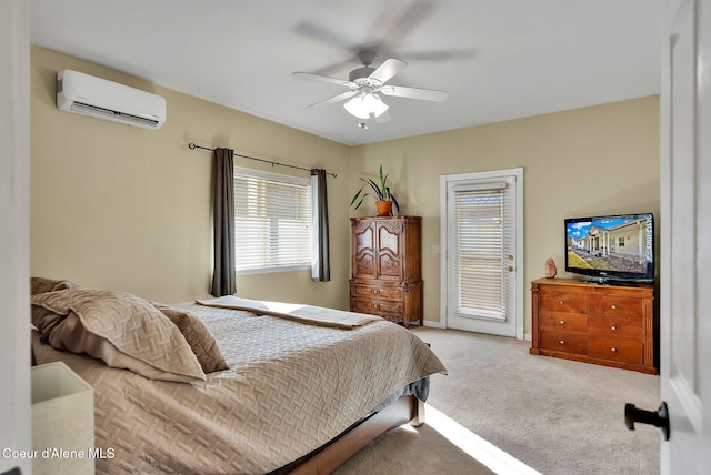 carpeted bedroom with ceiling fan, access to exterior, and a wall unit AC