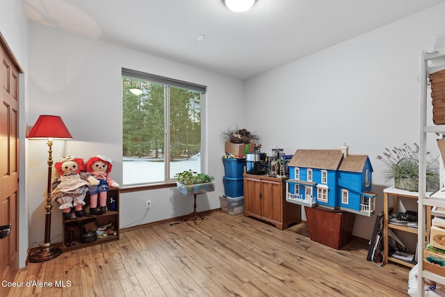 home office featuring light wood finished floors
