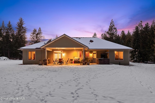 view of snow covered property