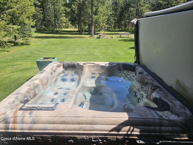 view of patio with a hot tub