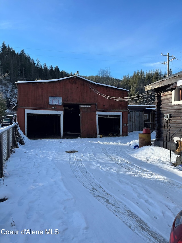 view of snow covered garage