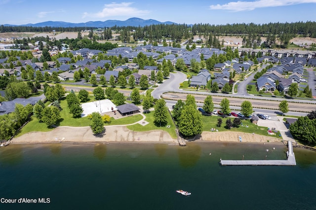 aerial view featuring a water and mountain view