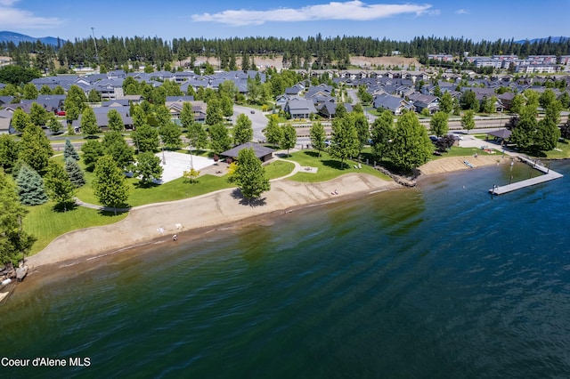 drone / aerial view with a view of the beach and a water view