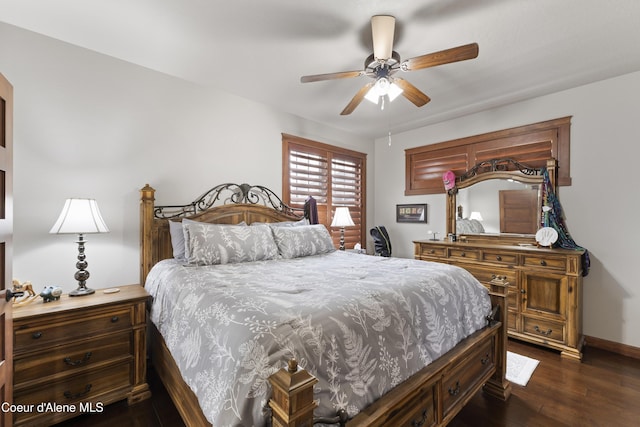 bedroom with dark wood-type flooring and ceiling fan