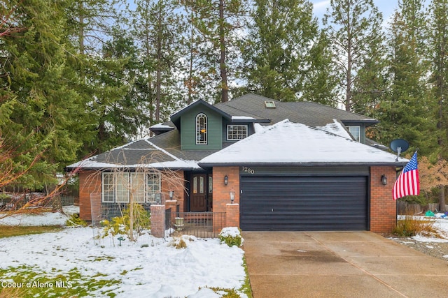 view of front of home with a garage