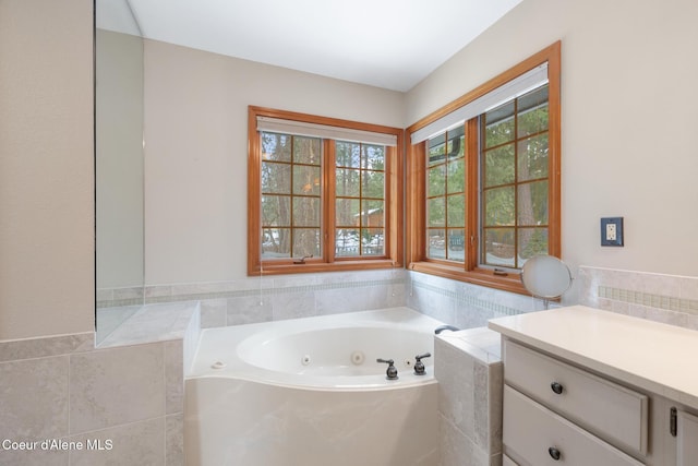 bathroom featuring a relaxing tiled tub