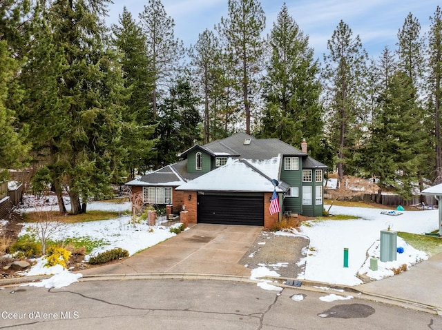 front of property with a garage