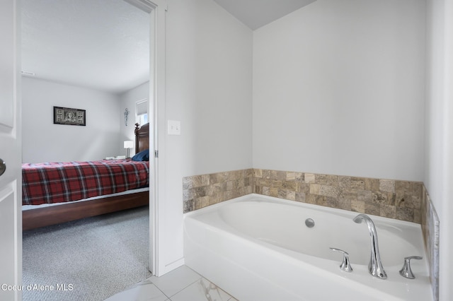 bathroom featuring a tub to relax in