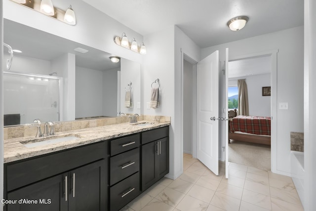 bathroom with vanity and an enclosed shower