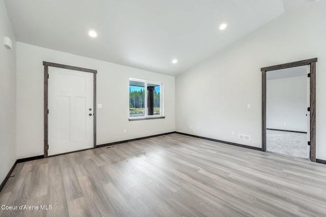 211 Rain Dr, Athol, ID 83801 - interior space featuring visible vents, recessed lighting, baseboards, light wood-type flooring, and vaulted ceiling