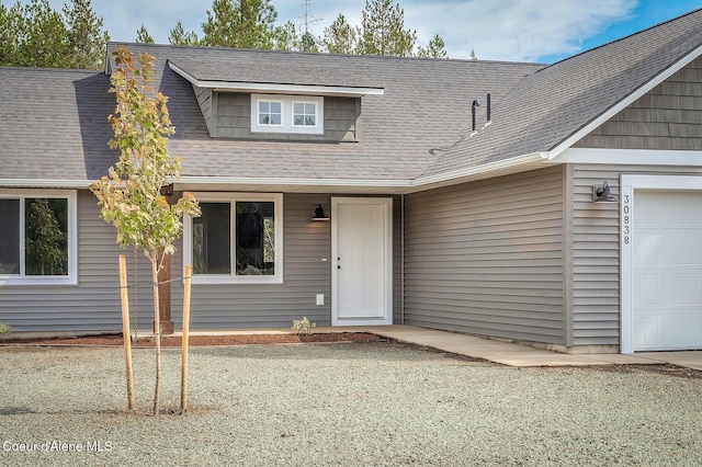 211 Rain Dr, Athol, ID 83801 - view of front facade with a shingled roof