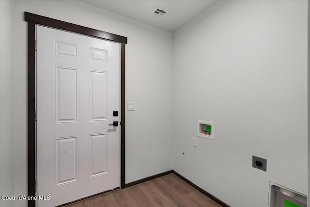 laundry room with washer hookup, dark hardwood / wood-style flooring, and hookup for an electric dryer