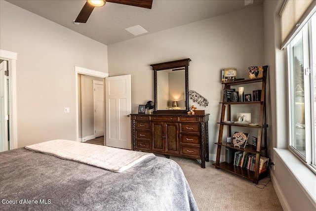 carpeted bedroom with ceiling fan