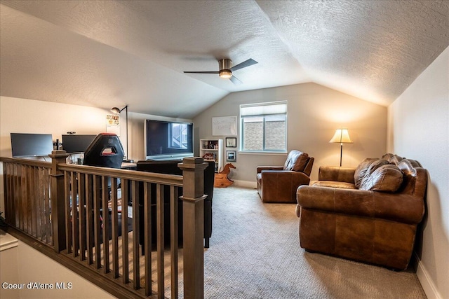 living room with vaulted ceiling, carpet, ceiling fan, and a textured ceiling