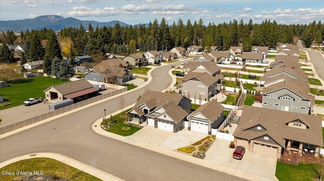 birds eye view of property featuring a mountain view