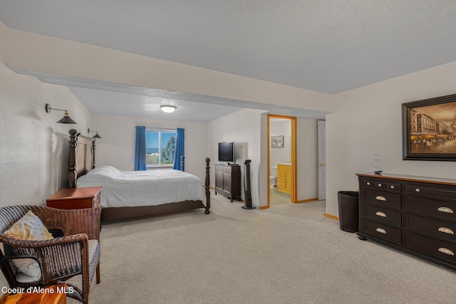 bedroom featuring light colored carpet