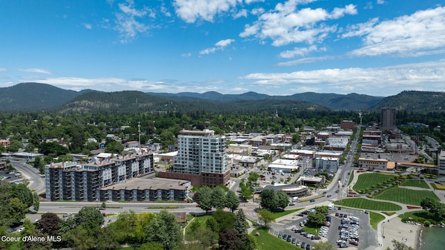 birds eye view of property featuring a mountain view