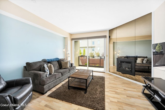 living room with light hardwood / wood-style floors