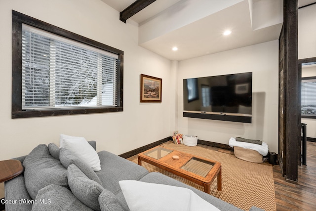 living room with hardwood / wood-style floors and beamed ceiling