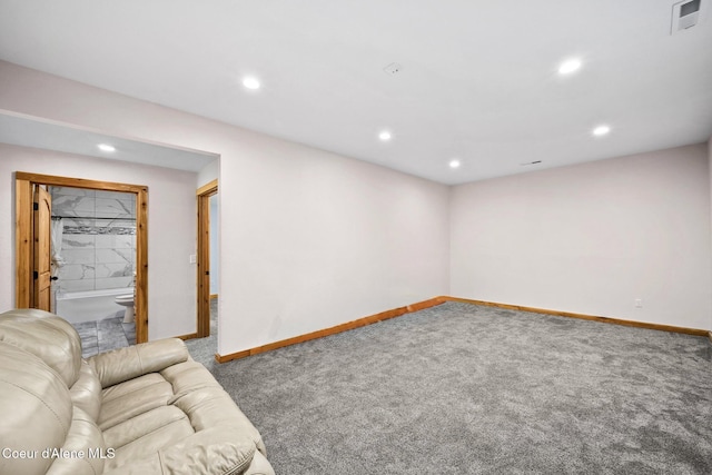 unfurnished living room featuring recessed lighting, carpet, visible vents, and baseboards