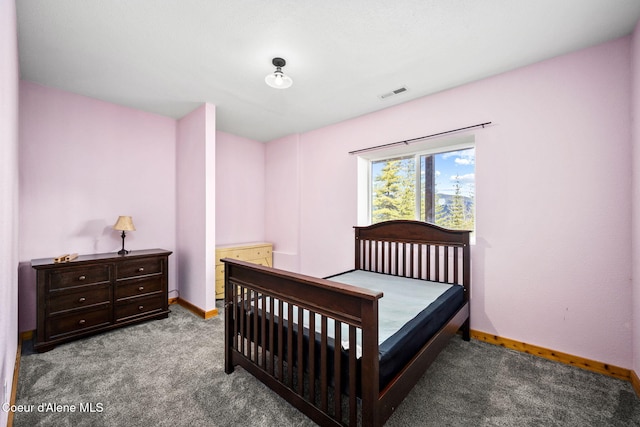 bedroom with visible vents, baseboards, and carpet