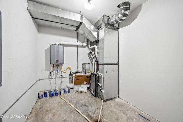 utility room with water heater