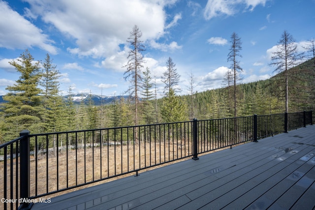 deck featuring a view of trees