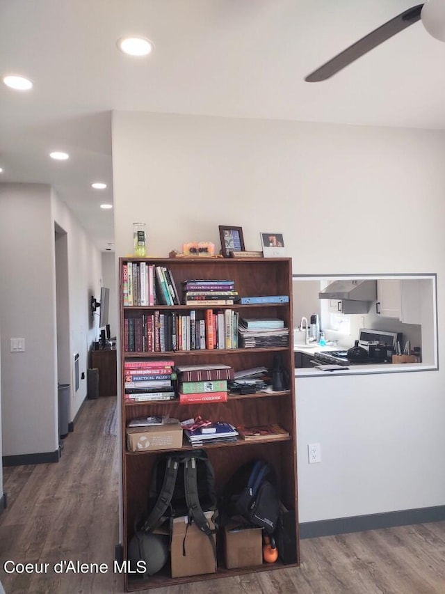 home office featuring ceiling fan and hardwood / wood-style floors