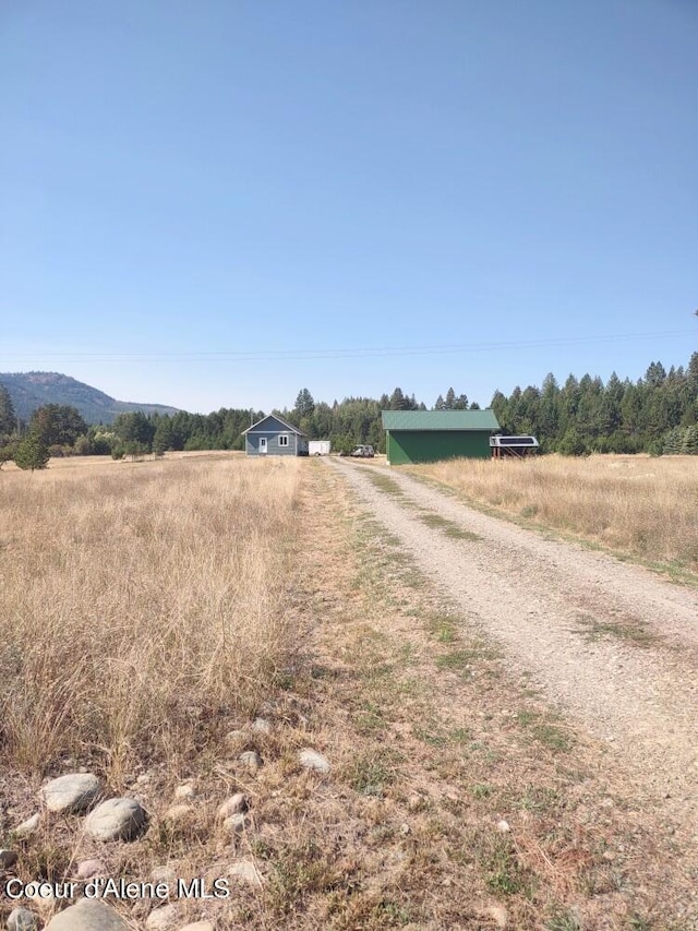 view of street featuring a rural view