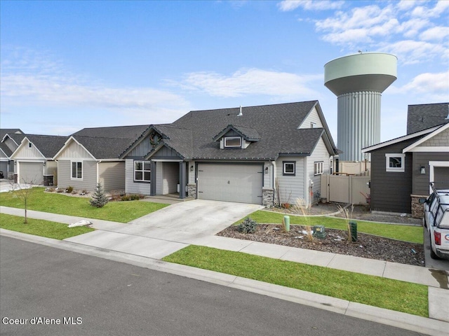 view of front of home with a garage and a front yard