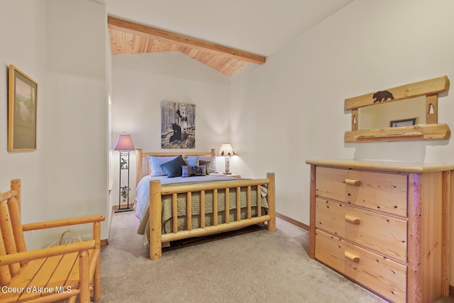 bedroom with light carpet, vaulted ceiling with beams, and wooden ceiling