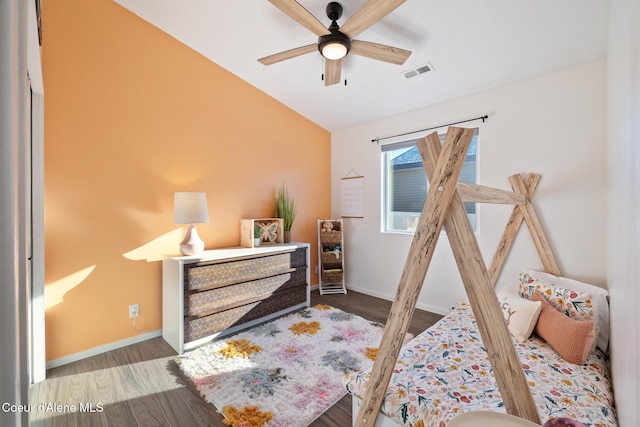 bedroom featuring lofted ceiling, hardwood / wood-style flooring, and ceiling fan