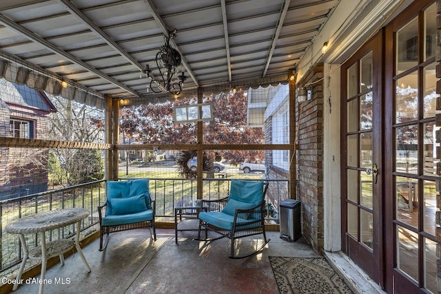 unfurnished sunroom with a healthy amount of sunlight