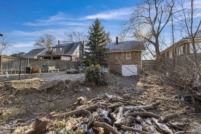 view of yard featuring an outdoor fire pit