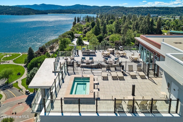 bird's eye view featuring a water and mountain view